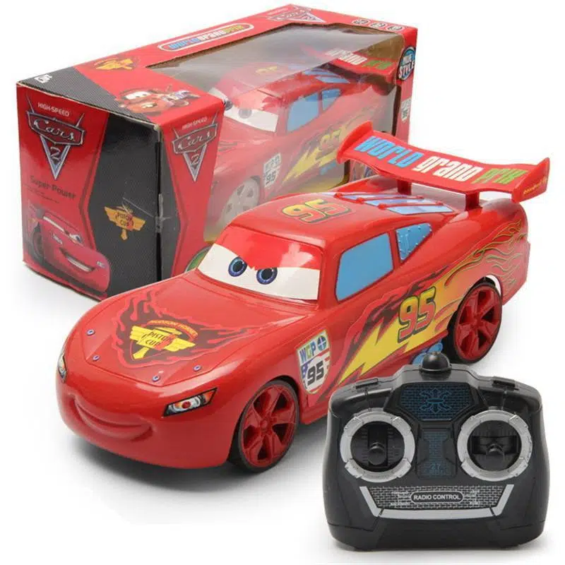 Photo d'une voiture télécommandée Flash McQueen de Cars avec sa boite et sa télécommande